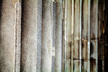 Close up fragment of antique columns background. Selective focus.