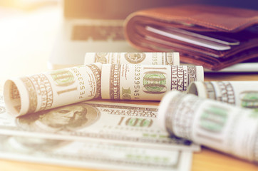 us dollar bill on wood table in home office.Bitcoins and New Virtual money concept.