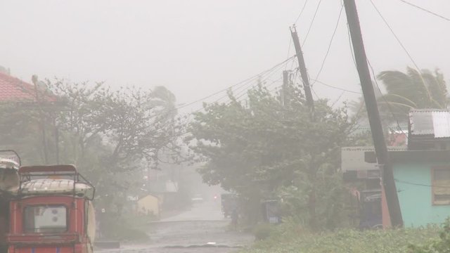 Hurricane Winds And Rain Batter Town - Megi