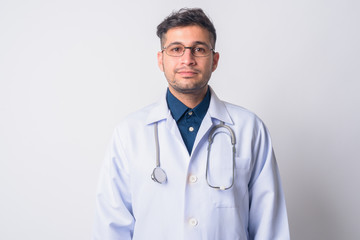 Portrait of young Persian man doctor with eyeglasses