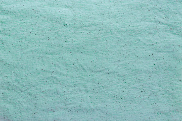 Blue soft crumpled paper texture close-up, abstract design background