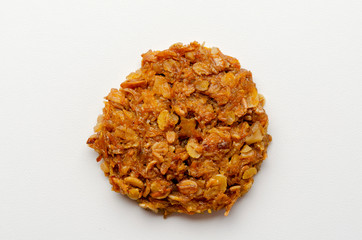 Pumpkin vegan oatmeal cookies with nuts on white