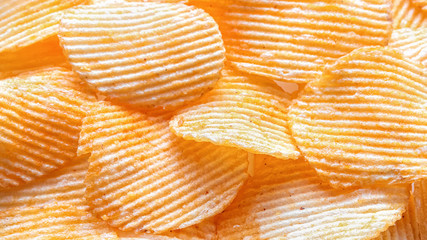 Background of corrugated potato chips with lobster.