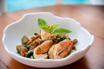 Spaghetti with spicy shrimp on white dish