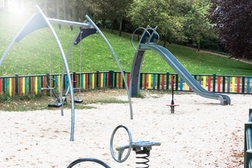 slide and swings in the city park