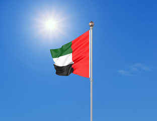 3D illustration. Colored waving flag of United Arab Emirates on sunny blue sky background.