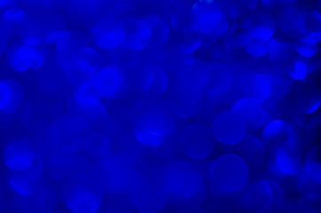 Abstract blue texture glitter lights background. de-focused.