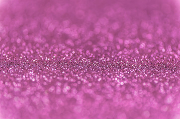Abstract pink texture glitter lights background. de-focused.