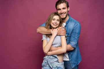 Happy loving couple isolated isolated on pink background. - Powered by Adobe