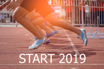 2019 Happy New year Concept. Side view of a Sport Man on Start line, Get Ready for New Challenge