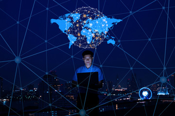 Business man work as a software programmer developer working on laptop computer with network connection,   internet of things IoT, digital 4.0,technology development digital  smart city concept