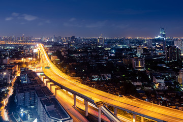 Expressway arial view during night with light trail, Bang Na, Bangkok Thailand