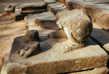 Remains of the Stone statues in Cambodian Angkor Wat Temple near Siem Reap city in Asia