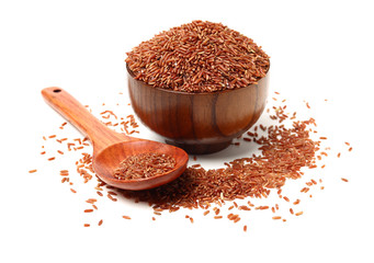Red rice on white background 