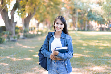 University Education learning abroad international ,Young students asian teenager smile with Note book, school folders reading book at high school university campus college  study learning in summer