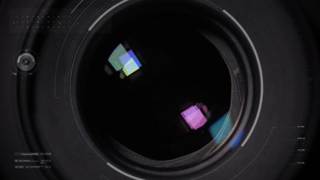 Diaphragm blades of the fixed lens opening and closing aperture f-stop adjustment of a photo camera close-up shot with HUD animation