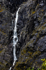 Fototapeta na wymiar Norwegian Autumn powerful waterfall in the Forest