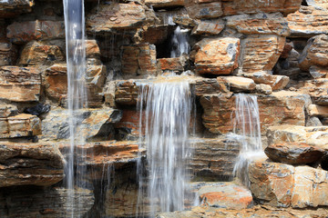 Fototapeta na wymiar Fake rock waterfall