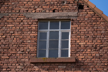 Fototapeta na wymiar Detail of brick wall building , old window