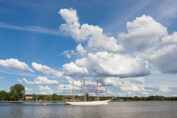 Tall ship Le Français sailing on the Seine River, through green lush countryside, Armada 2019,...