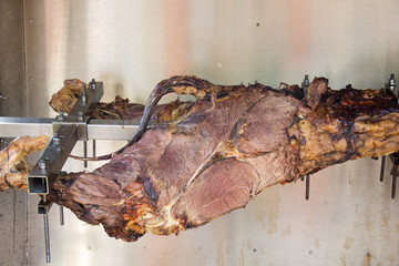 ox at the rotisserie in Germany, Dahn, 2019, cutting meat ox