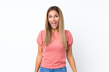 Fototapeta premium Young blonde woman over isolated white background with surprise facial expression
