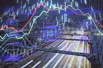 Forex chart on cityscape with tall buildings background multi exposure. Financial research concept.
