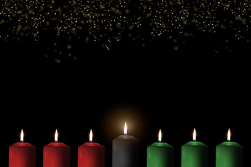 Kwanzaa for African-American cultural holiday celebration with candle light of seven candle sticks in black, green, red symbolising 7 principles of African Heritage (Nguzo Saba)