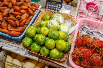 Traditional asian food market in Thailand, exotic fruits