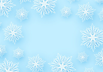 Winter background with paper snowflakes. Light blue design. Flakes with shadow effect. Copy space.
