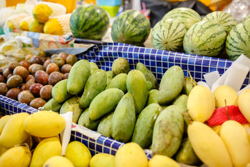 Traditional asian food market in Thailand, exotic fruits