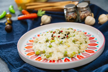 Risotto with broccoli, peas and lips