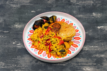 Prawn with rice - closeup of prawn with rice - traditionnal spanish food paella