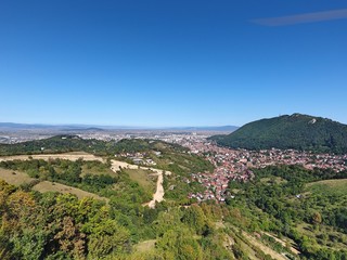 On the top of the city. Drone footage. Romanian mountains.