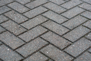 Texture of road tiles with herringbone pattern