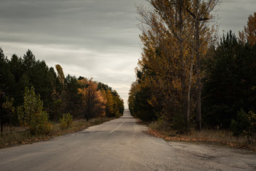 Empty streets in the Chernobyl exclusion zone near the ghost town of Pripyat and the Chernobyl nuclear reactor during autumn (Kiew, Ukraine, Europe)