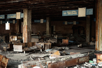 Fototapeta na wymiar Abandoned store in the empty ghost town of Pripyat near the Chernobyl nuclear reactor during autumn (Kiew, Ukraine, Europe)