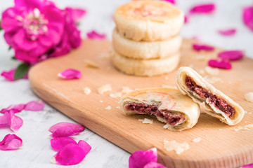 Chinese Yunnan specialty gourmet flower cake on a chopping board