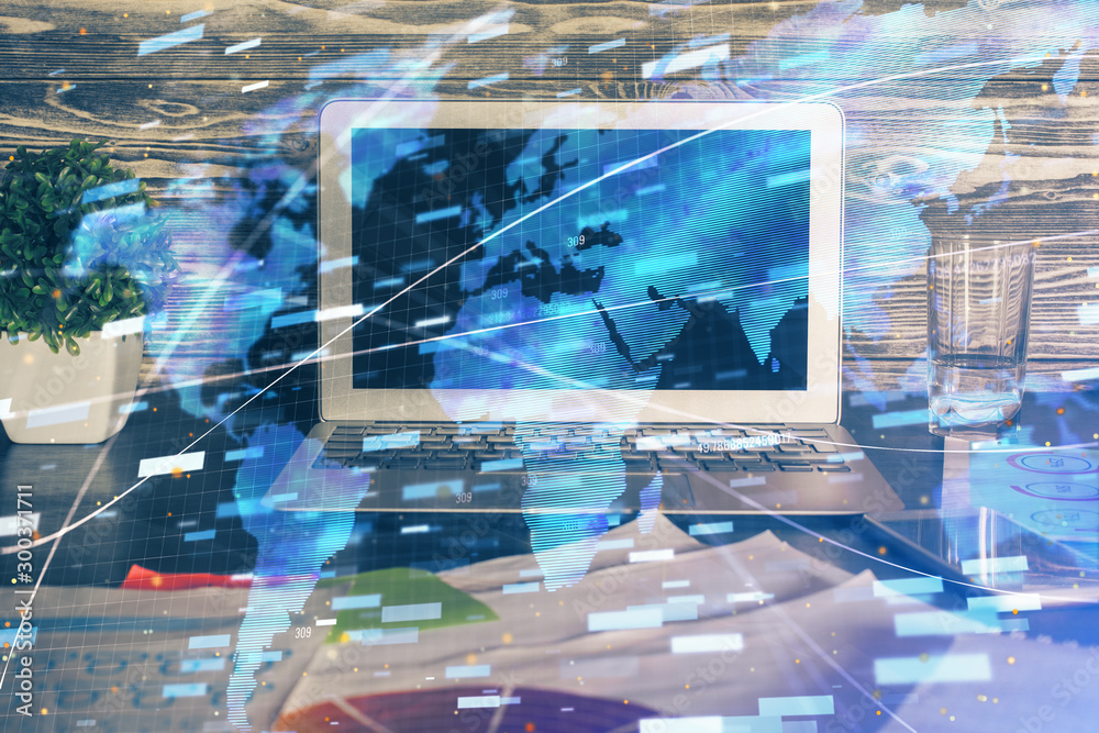 Wall mural technology theme drawing and table with computer. multi exposure. concept of information.