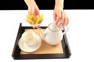 drinking a cup of flower tea is good for relaxing