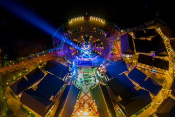 Aerial view of Legend Siam with symphony light show at night, Pattaya Thailand. Select focus.
