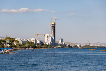 Fototapeta na wymiar The construction of new skyscraper in Larnaka