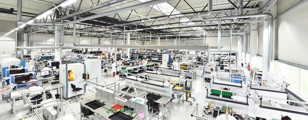 modern industrial factory for the production of electronic components - machinery, interior and equipment of the production hall - obrazy, fototapety, plakaty