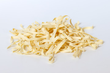 Egg pasta nest isolated on white background