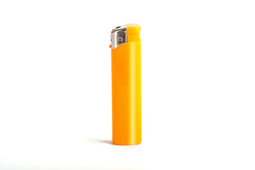 Yellow cigarette lighter isolated on a white