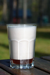 Oxygen foam in a glass beaker. An oxygen cocktail is a drink rich in oxygen and vitamins. Body improvement. Oxygen therapy