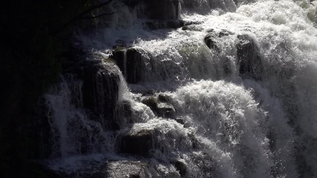 The incredible Victoria Falls on the Zambezi River. Shot from the Zimbabwe side of the river. Slow Motion.