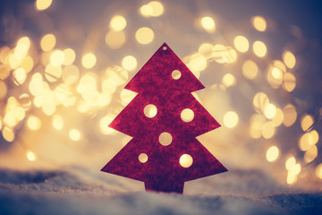 Decoupage christmas tree in snow. Christmas lights