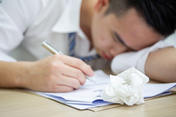 Naklejka premium Asian businessman's portrait. Workaholic and hard working people concept.
