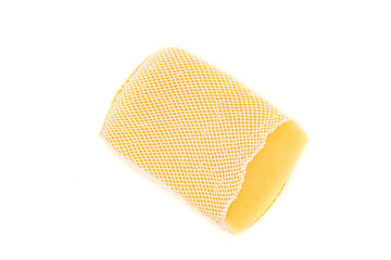 Dirty old dish washer sponge close up on white background, isolated.